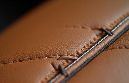 Close-up of custom leather interior stitching.